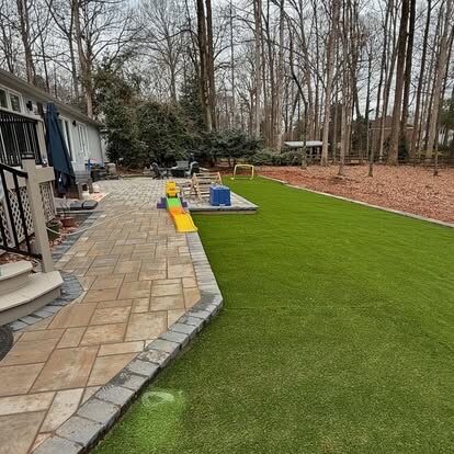 Artificial Turf & Paver Patio project by Andrew's Landscaping in the Charlotte NC area