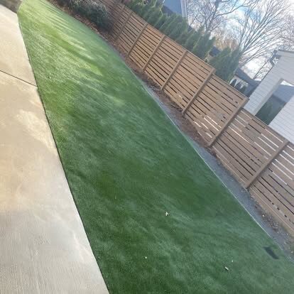 Artificial Turf Side Yard project by Andrew's Landscaping in the Charlotte NC area