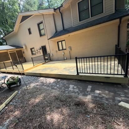 Concrete Pad & Fence project by Andrew's Landscaping in the Charlotte NC area