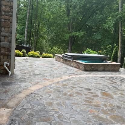 Flagstone Patio & Hot Tub project by Andrew's Landscaping in the Charlotte NC area