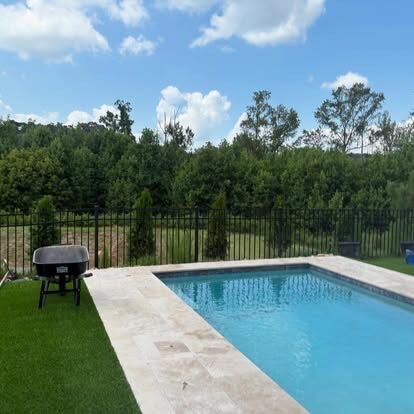 Pool Deck & Turf project by Andrew's Landscaping in the Charlotte NC area