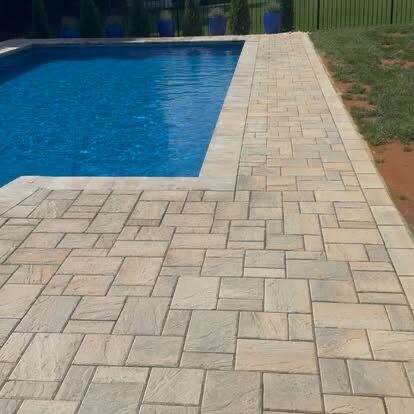 Poolside Paver Deck project by Andrew's Landscaping in the Charlotte NC area