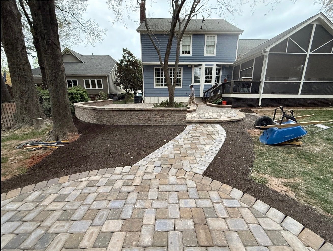 Paver patio and seating wall built by Andrew's Landscaping near Denver, NC