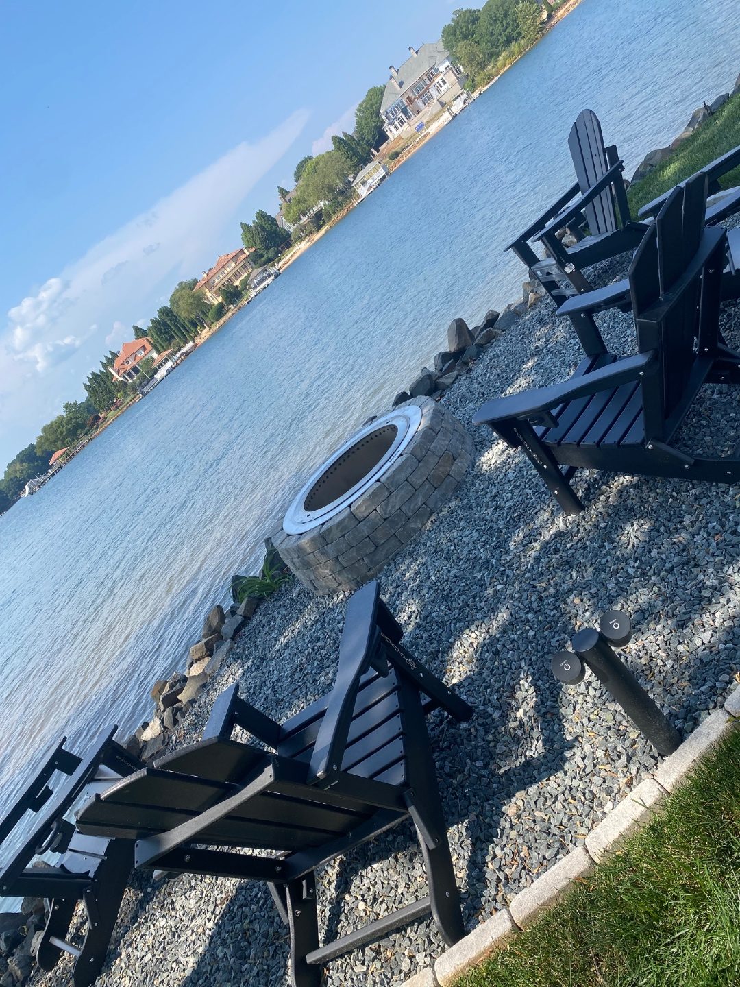 Lakeside Stone Firepit Adirondack Chairs — project by Andrew's Landscaping