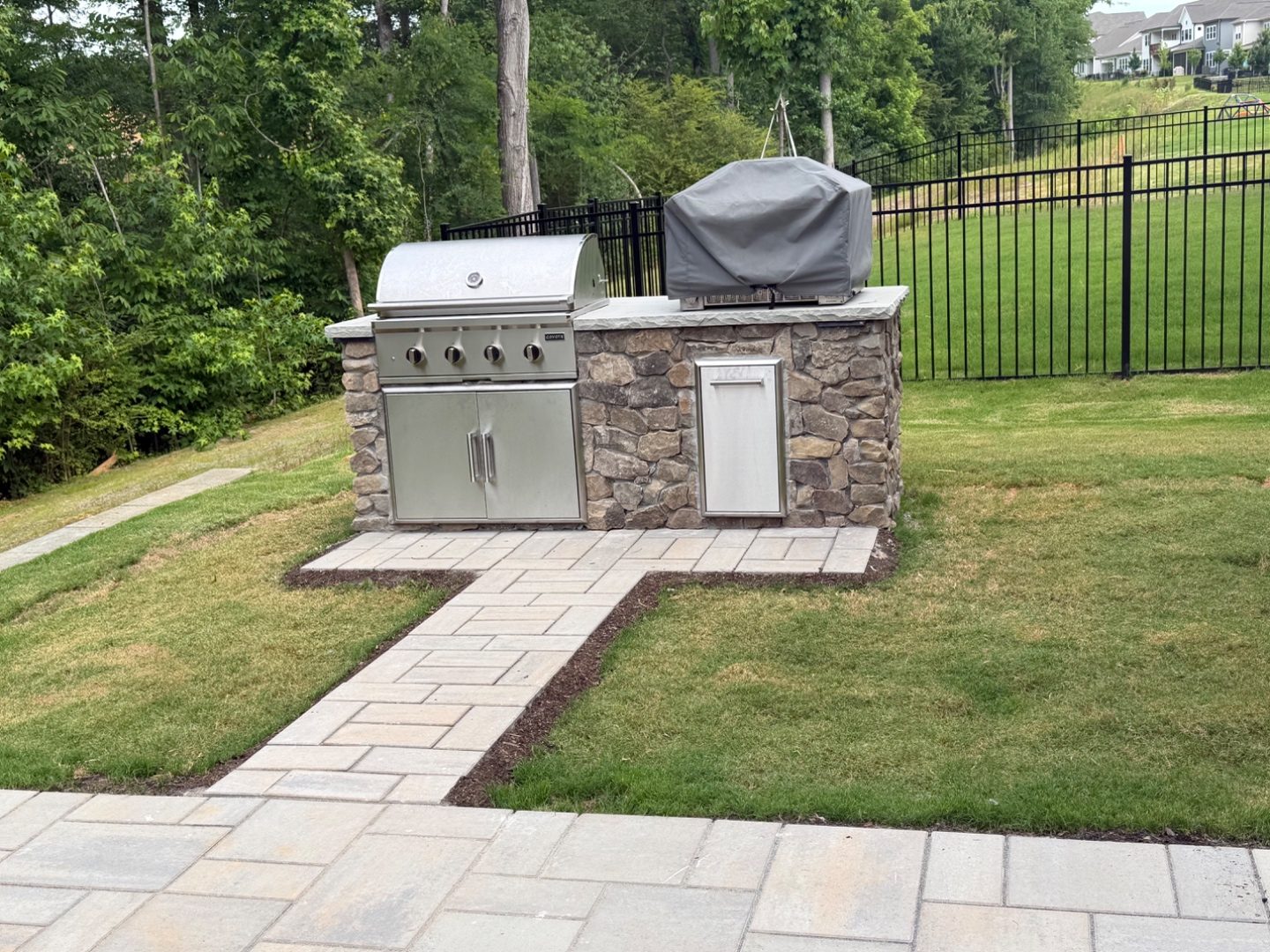 Stone Outdoor Kitchen Grill Island — project by Andrew's Landscaping